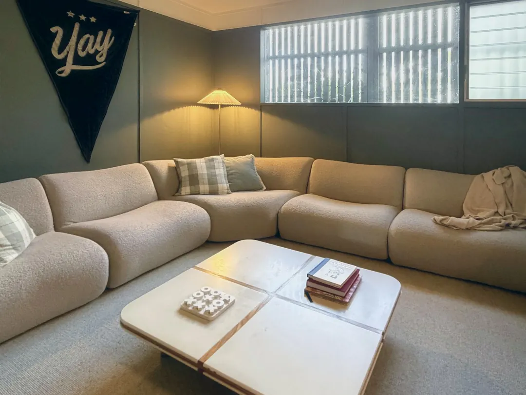 Rumpus room with a curved modular sofa